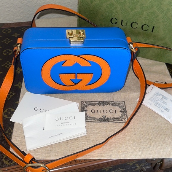 Authentic Gucci interlocking GG blue & orange calfskin padlock hardsided bag